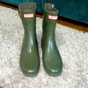 Olive green Hunter rain boots.